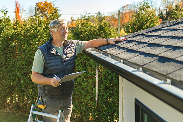Professional Roofing technician working in Port Jefferson Station, NY